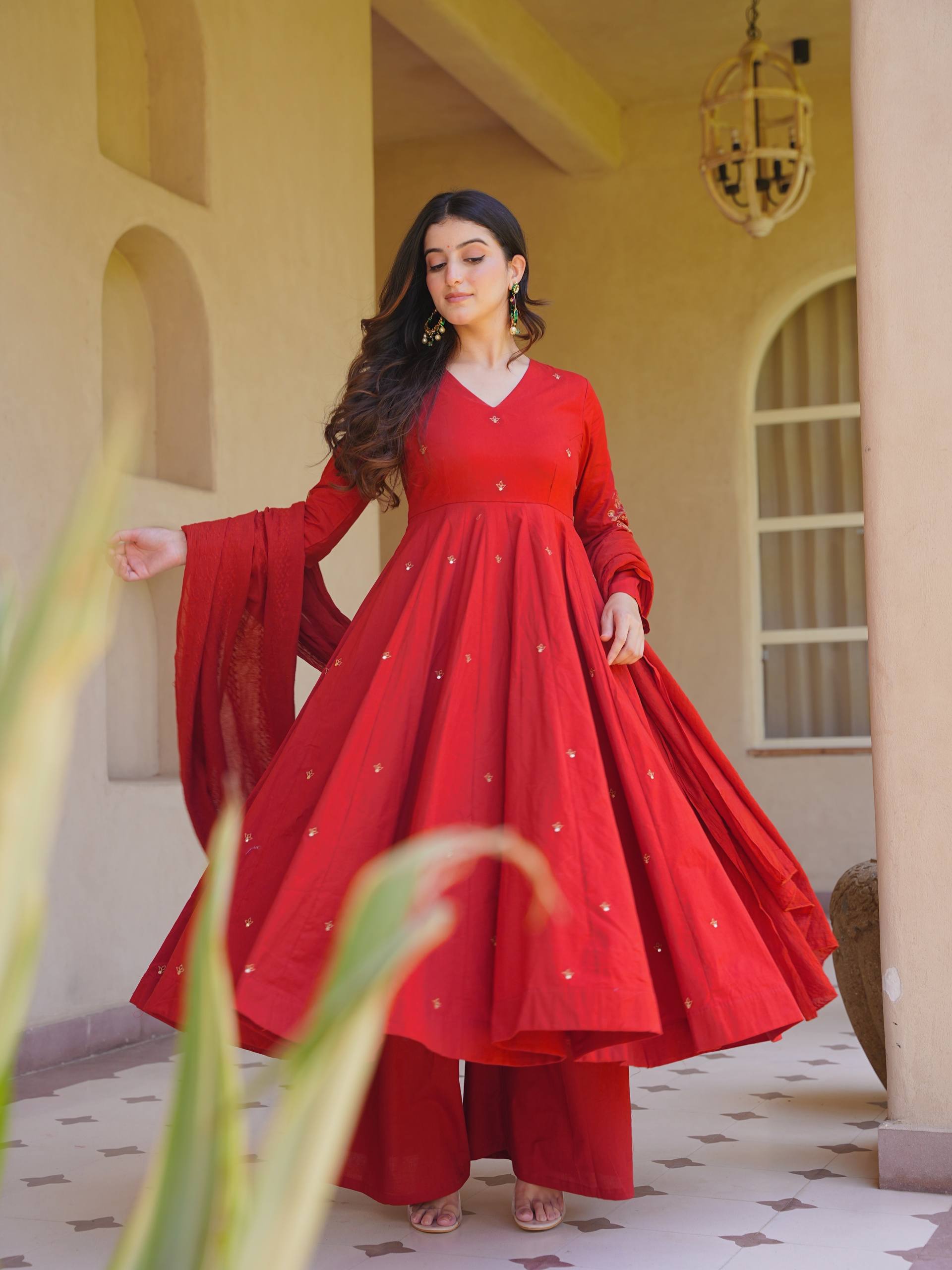 Rich Magenta Maroon Flared Anarkali Suit Set Adorned with Delicate Scattered Floral Embroidery and an Elegant V-Neckline